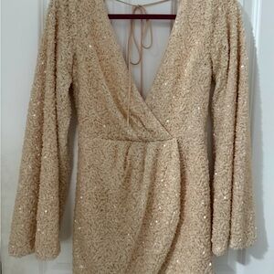 REVOLVE Long Sleeve Sequin Wrap Mini Dress in Champagne